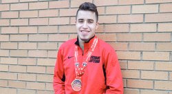 Feature image for Political Science Major Receives Bronze Medal for Olympic Weightlifting