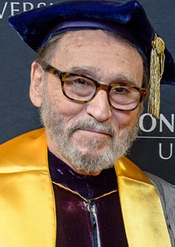 photo of Joseph Attansio in commencement regalia