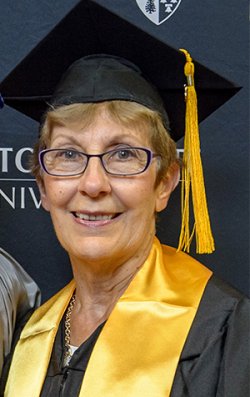 Photo of Marie Attanasio in commencement regalia