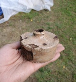 Mid-19th-century ceramic ink well recovered at Dunkerhook.