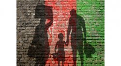 family shadows on brick wall