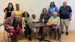 group of event attendees and Teresa Fiore