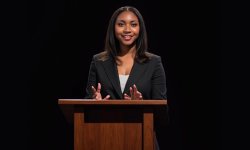 photo of Leila Simeon at a podium