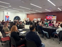 a full room of attendees at Visiones de Cuba event