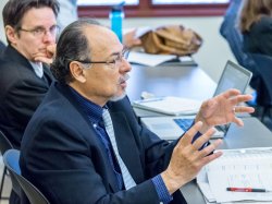 College of Humanities and Social Sciences Associate Dean Luis Montesinos asks a question.