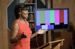 Blackmon shares a laugh with the audience.