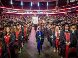 Academic processional during commencement in an arena