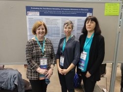 Mary Boyle, Christa Akers, and Roberta Elman with their poster at the recent ASHA convention in Boston.