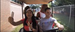 students on golf cart