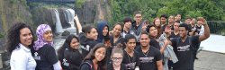 upward bound students in front of waterfall