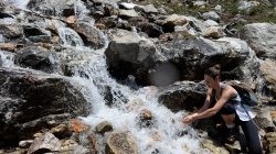 drinking from stream