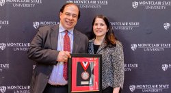Dr. Anthony Scriffignano and his wife with his Distinguished Alum Award