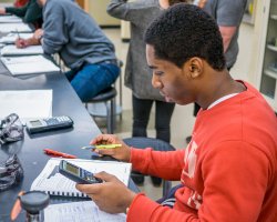 student working on chemistry problem