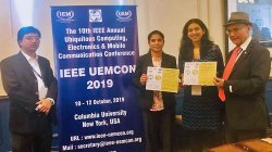 receiving best paper award certificates at UEMCON 2019