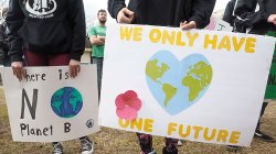 Signs at climate rally
