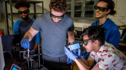 students working in gravitational wave lab