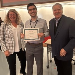 Matteo Guzman receiving his award at the Casabona Future Scientists Competition