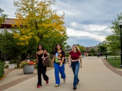 three students walking