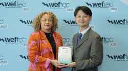 Dr. Deng receiving the WEF Camp Award for 2023