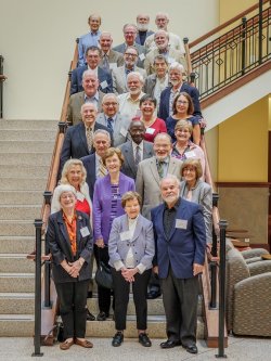 Emeriti faculty on staircase in November 2017
