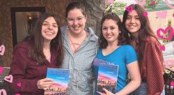 Photo of Monica Archer and Lauren Semler and two additionaly award recipients