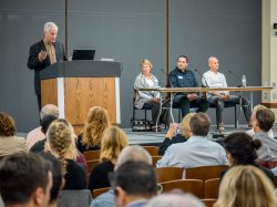 David Brancaccio, at podium, moderated the DIY panel, which included Jules Pieri, co-founder and CEO of The Grommet; Marc de Vinck, professor Practice in Creativity at Lehigh University; and Jeff Wald, co-founder and COO of Work Market.