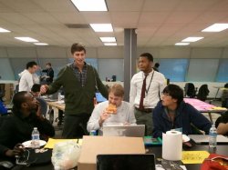Freshman Altarik Banks (second from right) and members of his team work on their project.