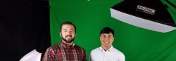 Students in front of green screen