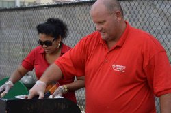 Preya Sanasie and Steve Ruggiero man the grill