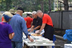 Employees line up to be served by VP Bressler and AVP Connolly