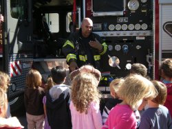 The children are given the chance to ask the firefighters questions.