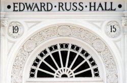 Image of exterior details of Russ Hall including the full name of the building, Edward Russ Hall, and the construction date, 1915.