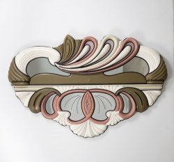 A large artwork featuring mirrors, swirls of brown, pink, and white.