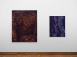 Two paintings of varying size and color hang side by side on a white wall.