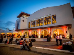 photo of the Kasser theater at dusk