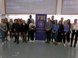 group photo after presentation by Newark Division of the Federal Bureau of Investigation