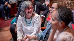 employees conversing in theater
