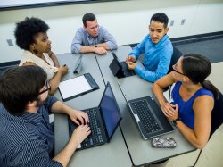 faculty in group work setting