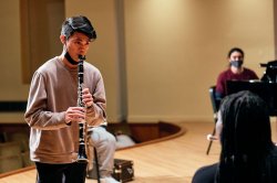 Pathways program clarinet student on stage as part of workshop