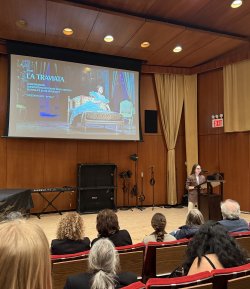 Professor Leah Batstone giving a lecture on La Traviata