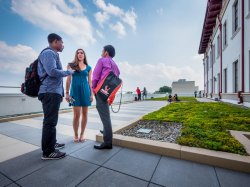 Students standing on CELS patio