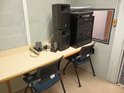 Soundproof room with record player and speaker