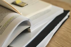 open textbook on a table