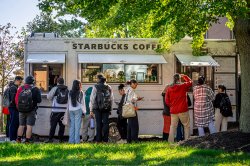 starbucks truck with students in line