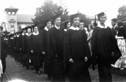 students walking at commencement in the 1930's