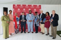 Bloomfield College Alumni Association members holding service award plaques