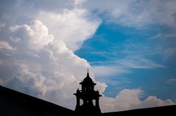 clouds in sky over Cole Hall bell tower