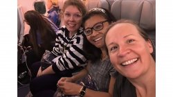 students on flight for study abroad in Finland