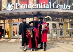 math ed phd grads with their mentors outside the Prudential Center
