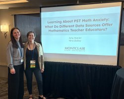 Dr. Bailey with doc student after their presentation